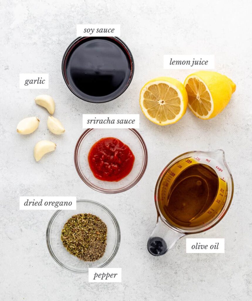 Ingredients for marinade include soy sauce, lemon juice, garlic, sriracha, olive oil, dried oregano, and pepper.