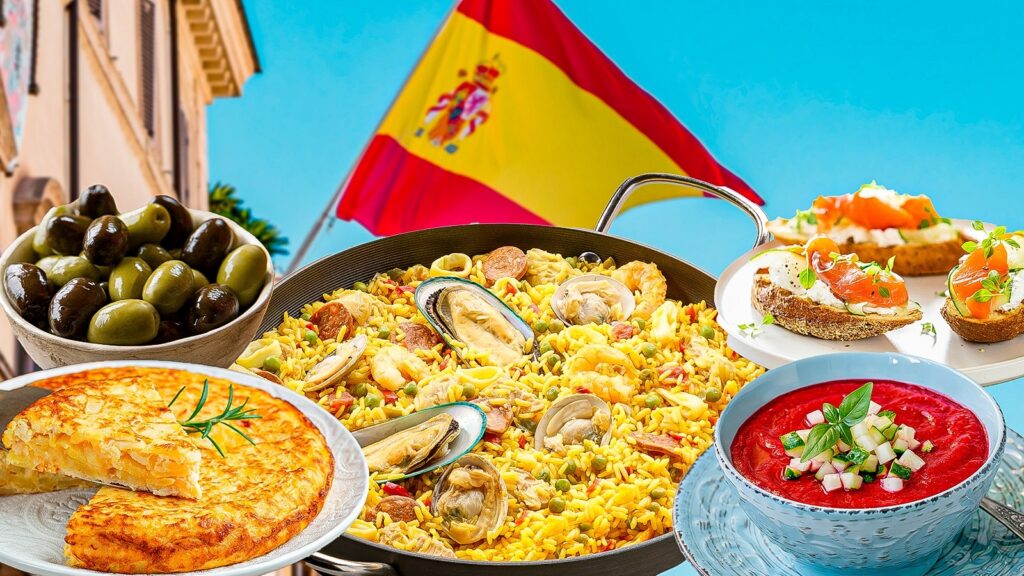 Assorted Spanish cuisine with paella, tortilla, olives, tapas, and gazpacho, set against a backdrop of the Spanish flag.