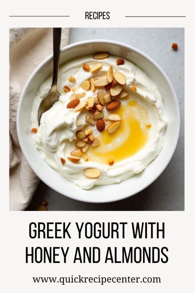 Bowl of Greek yogurt topped with honey and almonds, perfect for a healthy breakfast or snack.