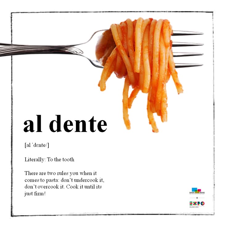 Fork with al dente spaghetti and al dente definition: pasta cooked firm to the bite.