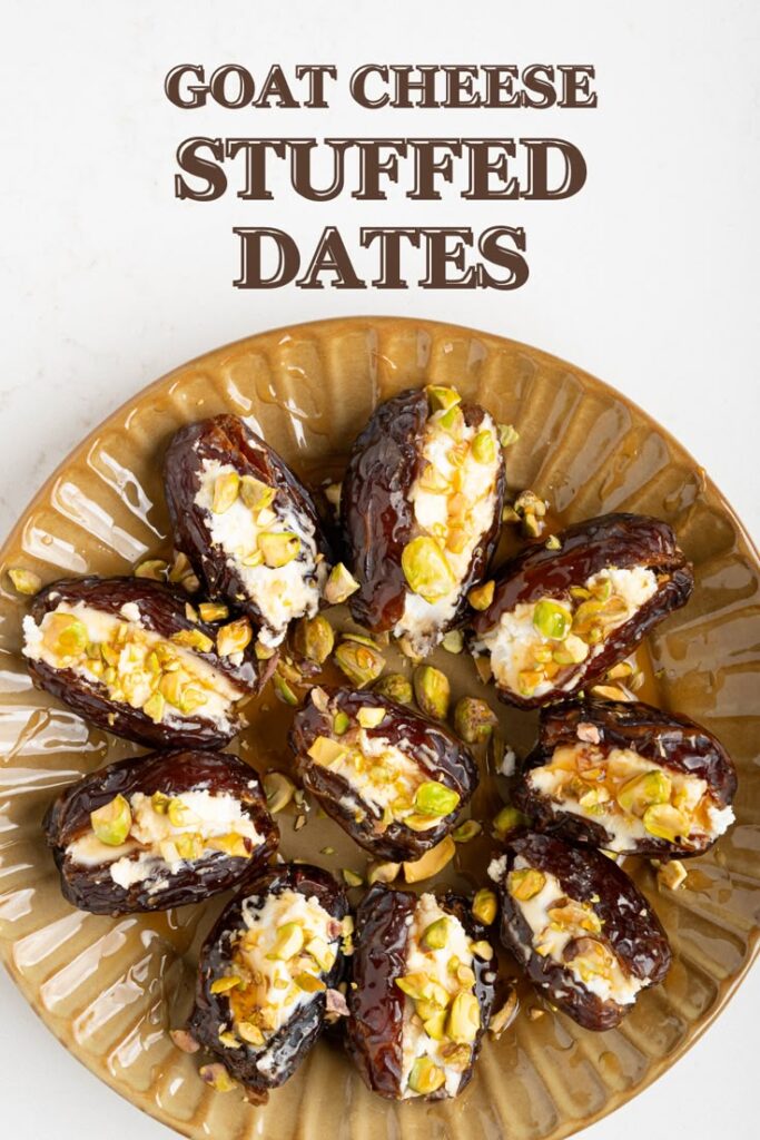 Plate of goat cheese stuffed dates topped with chopped pistachios and honey drizzle, perfect appetizer idea.