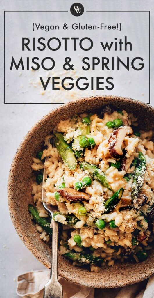 Vegan and gluten-free miso risotto with spring veggies in a bowl, garnished and ready to eat.