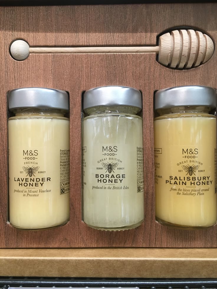 M&S honey gift set featuring Lavender, Borage, and Salisbury Plain jars with wooden honey dipper in a wooden box.