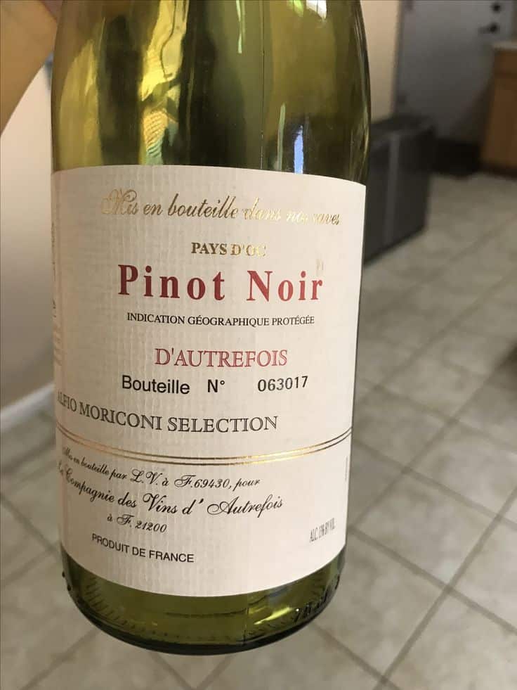 dautrefois pinot noir - Marry Me Chicken : Easy, Creamy, and Delicious Meal Bottle of Pinot Noir, D'Autrefois, Pays d'Oc, French wine with label details, indoors on a tiled floor.