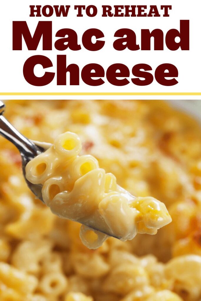 Close-up of cheesy macaroni on a fork with text overlay: How to Reheat Mac and Cheese.