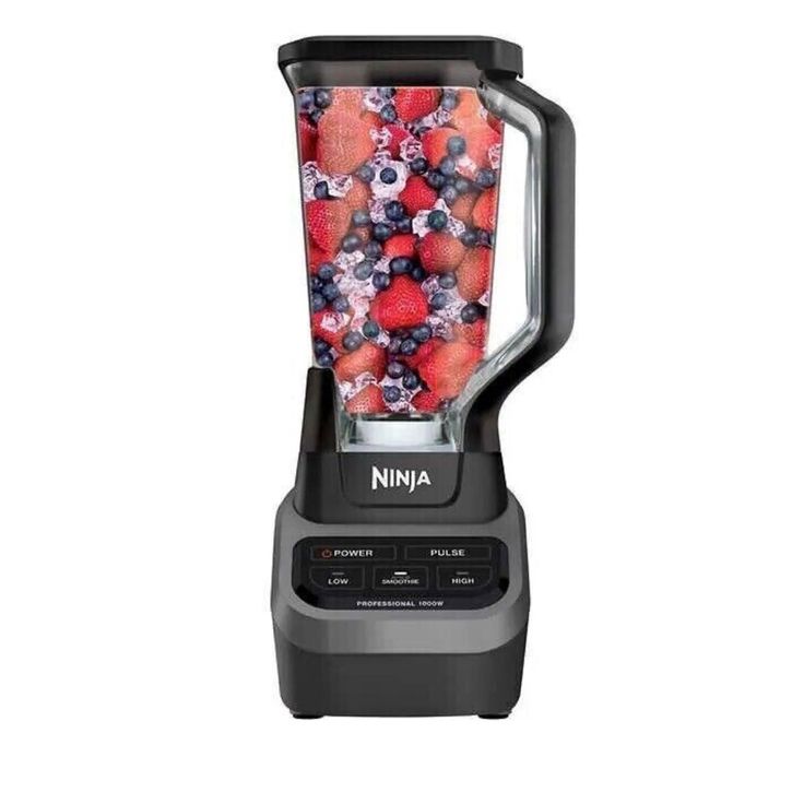 Fresh berries in a Ninja blender, ready for smoothies. Perfect for healthy, nutritious drinks and recipes.