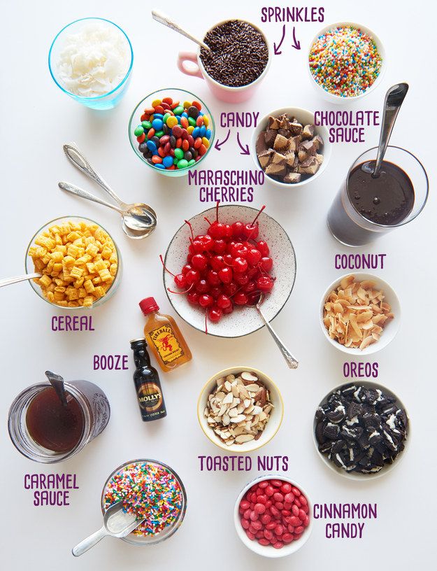 Assorted ice cream toppings: sprinkles, candy, chocolate sauce, maraschino cherries, coconut, cereal, toasted nuts.