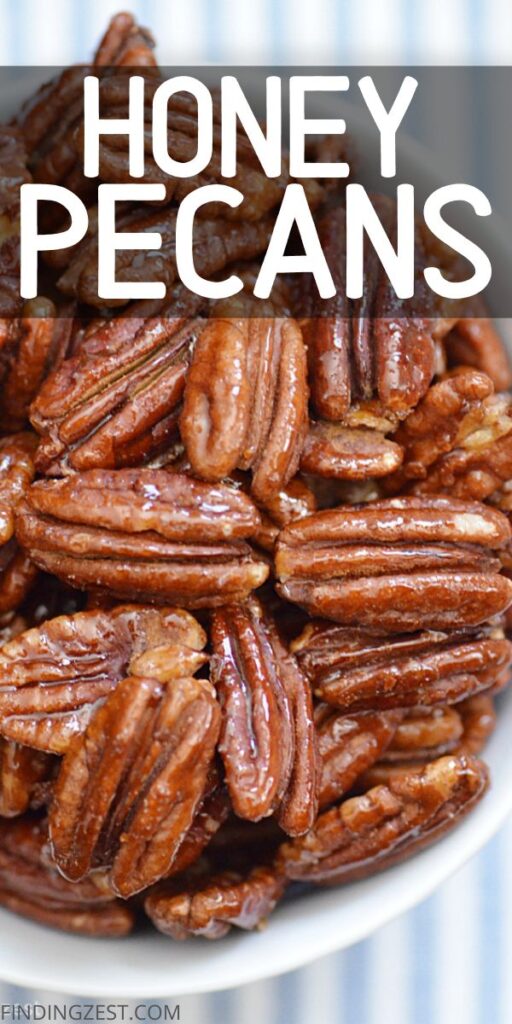 Close-up of glazed honey pecans in a bowl, perfect for snacking or topping desserts.