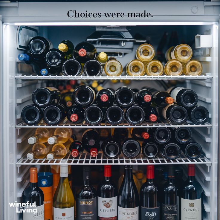 Fully stocked wine fridge with assorted bottles and humorous text Choices were made above.