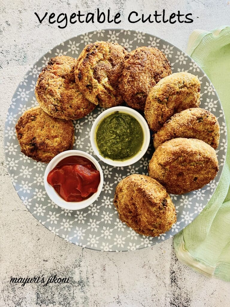Plate of crispy vegetable cutlets with green and red chutney, perfect for snacks or appetizers.