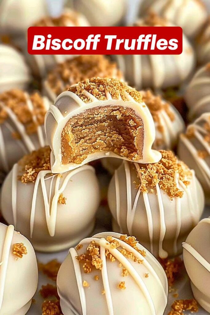 Delicious Biscoff truffles with creamy filling, topped with cookie crumbs and white chocolate drizzle.