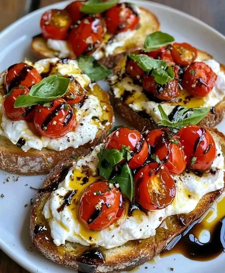 Easy Classic Italian Bruschetta with Tomatoes and Basil - Loriana Shea Cooks - 10 Crowd-Pleasing Appetizers That Will Wow Your Party | Delicious bruschetta with cherry tomatoes, basil, ricotta, and balsamic glaze on toasted bread.