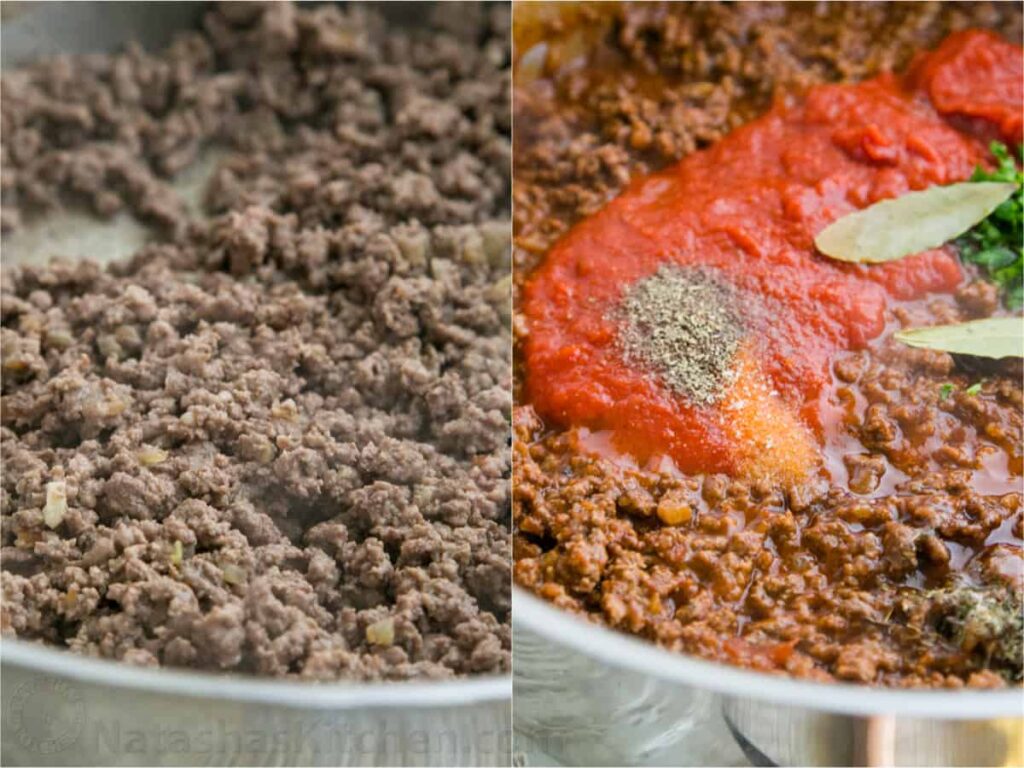 Ground beef cooking in a skillet with tomato sauce, spices, and bay leaves for a savory homemade pasta sauce.