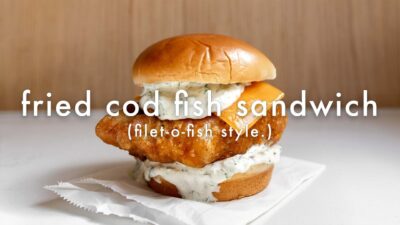 Fried cod fish sandwich with tartar sauce and cheese on a bun, Filet-O-Fish style.